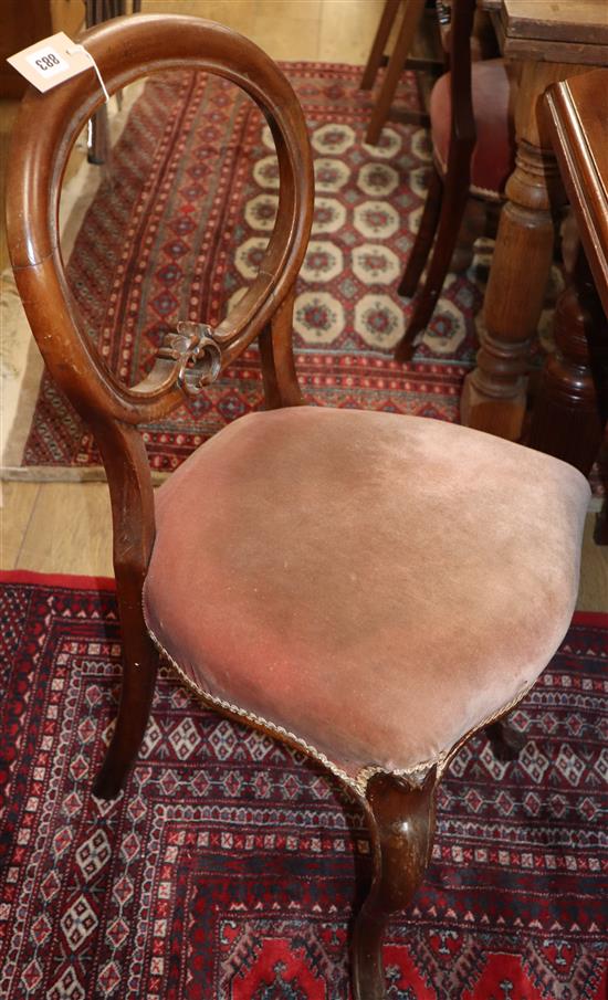 A set of four Victorian mahogany balloon back dining chairs, on cabriole legs (a.f.)